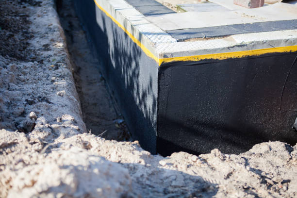 Professional Exterior Waterproofing technician working in Jackson, NJ